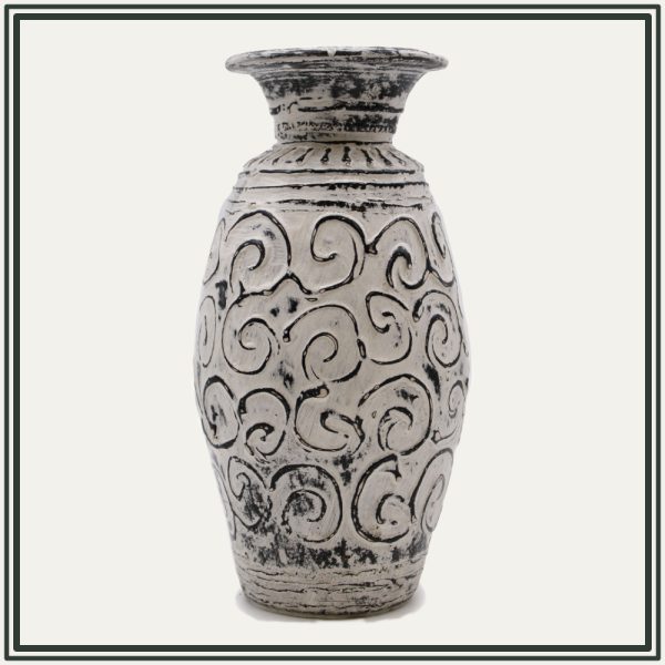 This tall, unique and eclectic bohemian home vase, perfect for the UK, features a cream-colored distressed finish with bold, raised black swirl patterns covering its shapely body. The top rim and base also show distressed black accents. The vase has a classic, elegant shape with a flared neck and substantial base, perfect for displaying faux flower arrangements