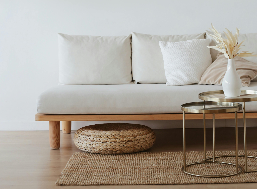 White Couch on Wooden Floor with natural fibre rug